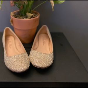 Size 8 tan-gold dress flats with pearl and silver rhinestone embellishments.